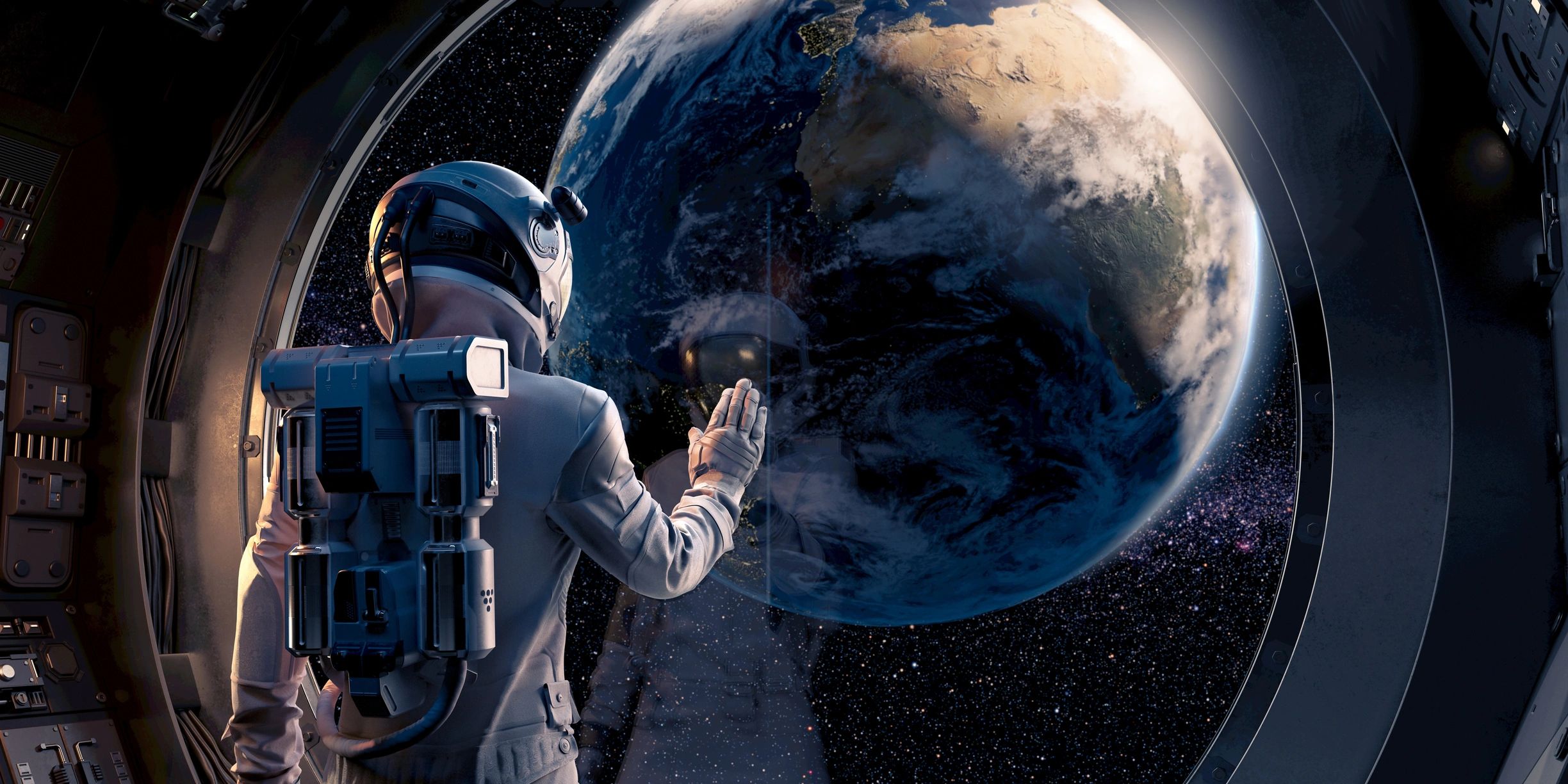 Astronaut reaching toward a planet